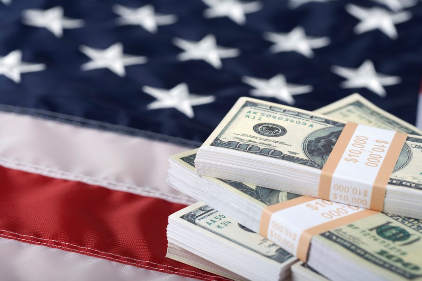 101115859-us flag and money stacks.jpg