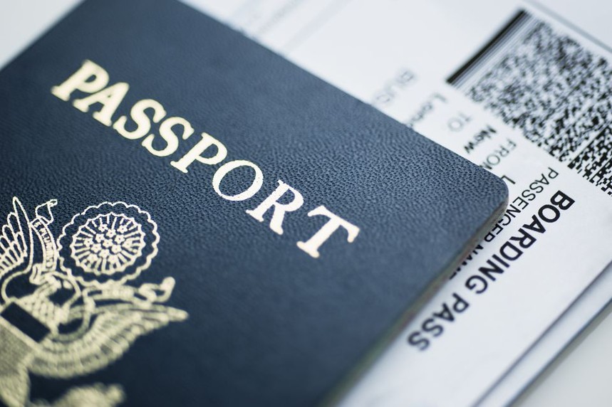 american-passport-with-boarding-pass-inside-114847640-592ee1053df78cbe7edbf244.jpg
