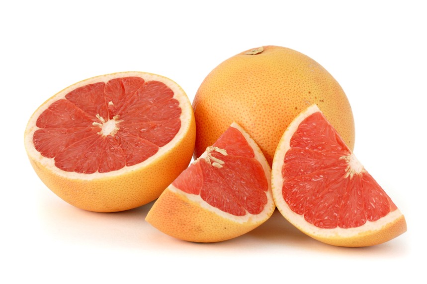 Citrus_paradisi_(Grapefruit,_pink)_white_bg.jpg